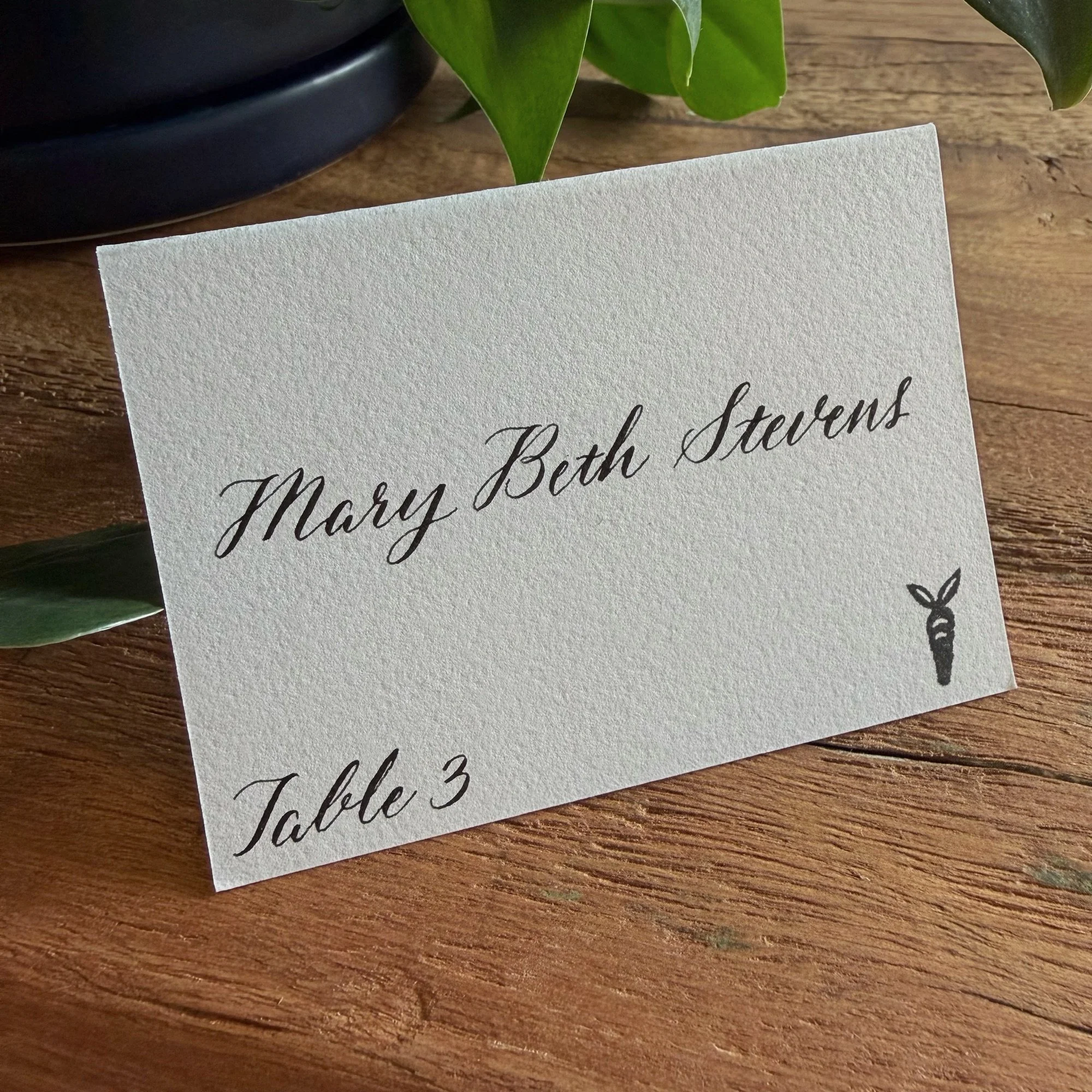 Wedding escort card with meal choice icon