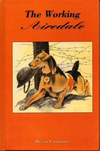 Book cover titled 'The Working Airedale' showing a dog with a red collar, sitting near a barbed wire fence, with a military helmet hanging on a post in the background.