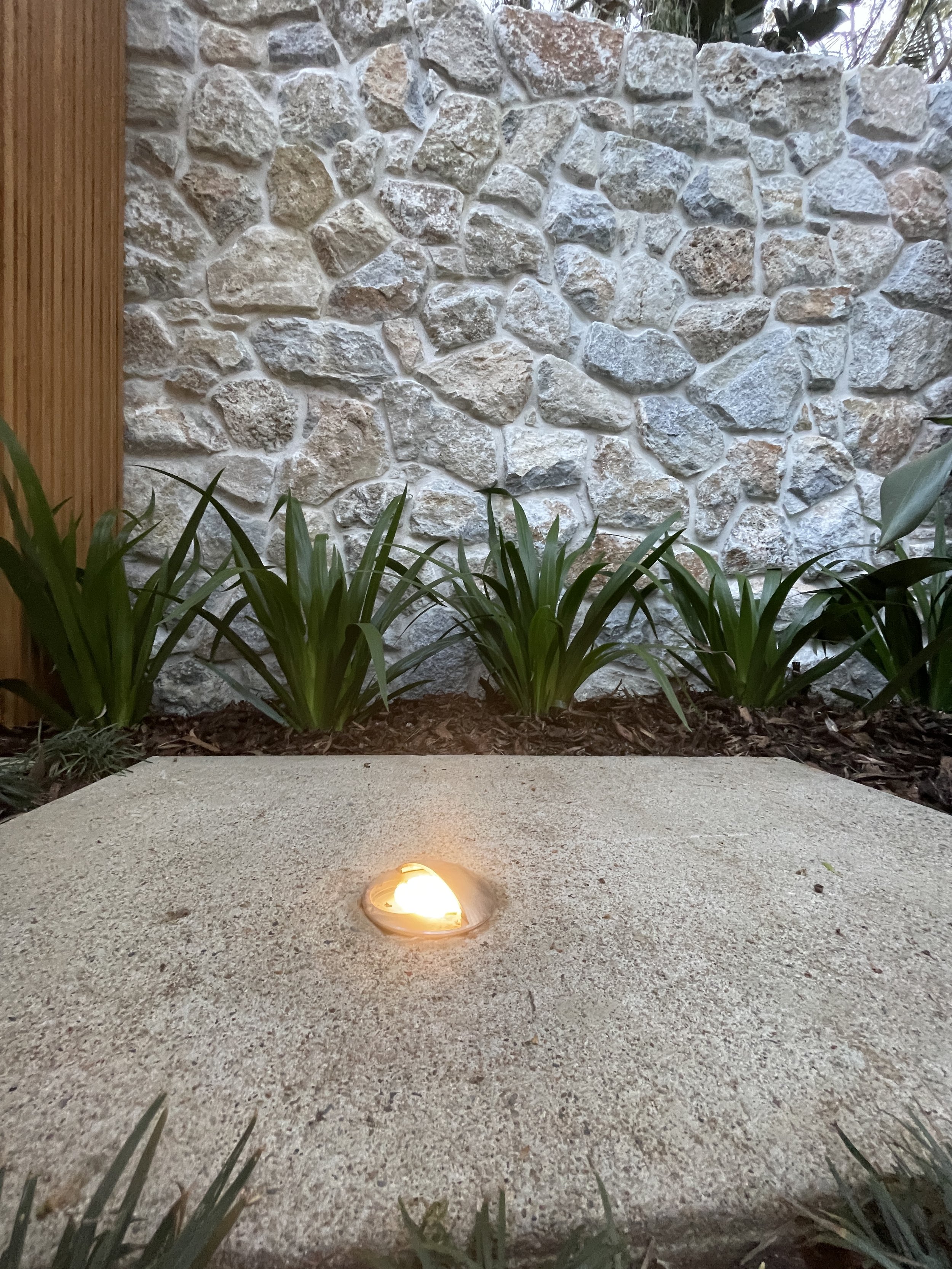 Outdoor lighting & natural stone make the perfect combination in practical lighting & textural balance. Project Sunshine Beach Queensland.