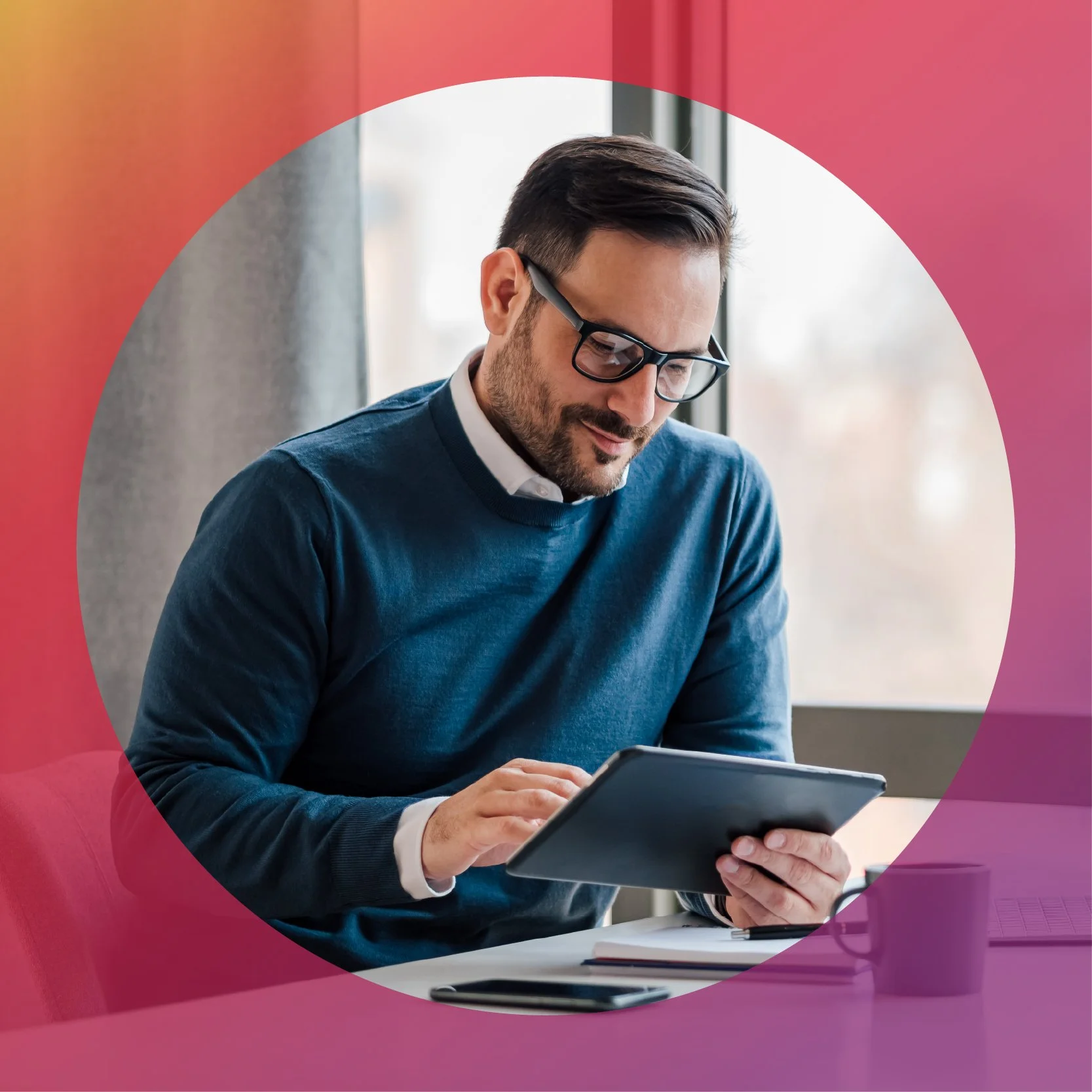 Man holding a tablet in an office setting