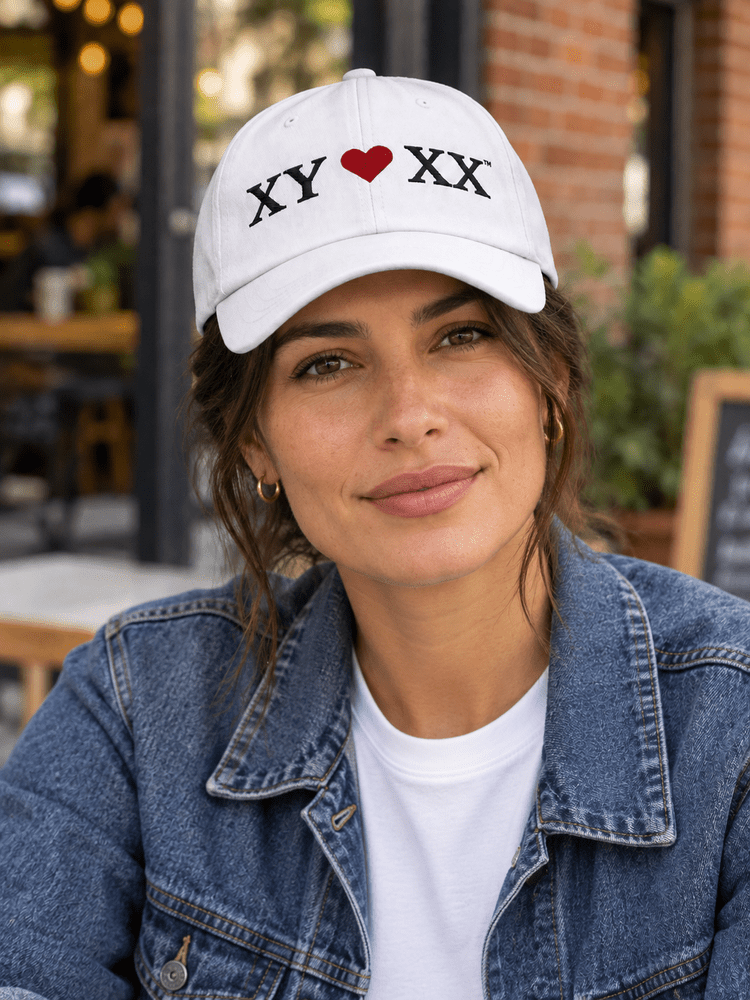 Woman in white XY heart XX hat