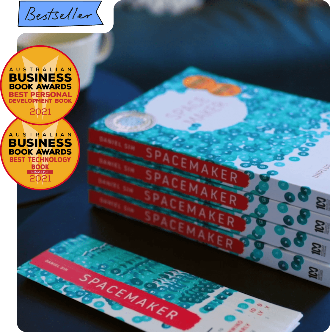 A stack of Spacemaker books and bookmarks