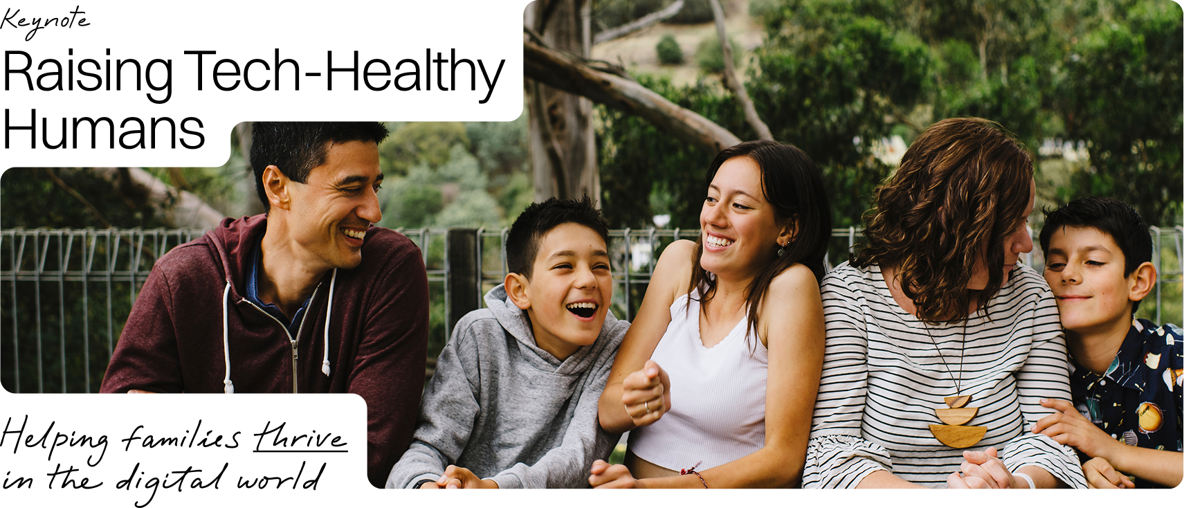 Text reads "Raising Tech-Healthy Humans: Helping families thrive in the digital world." A family of six sitting outdoors on a bench, smiling and laughing together. The background shows trees and greenery.