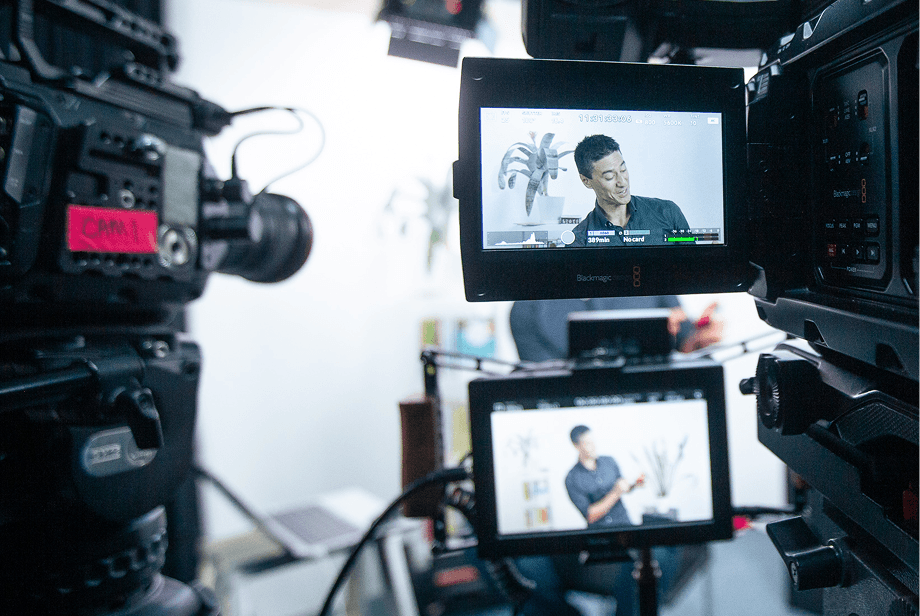 A photo of camera equipment in a studio filming a video for Daniel Sih's youtube