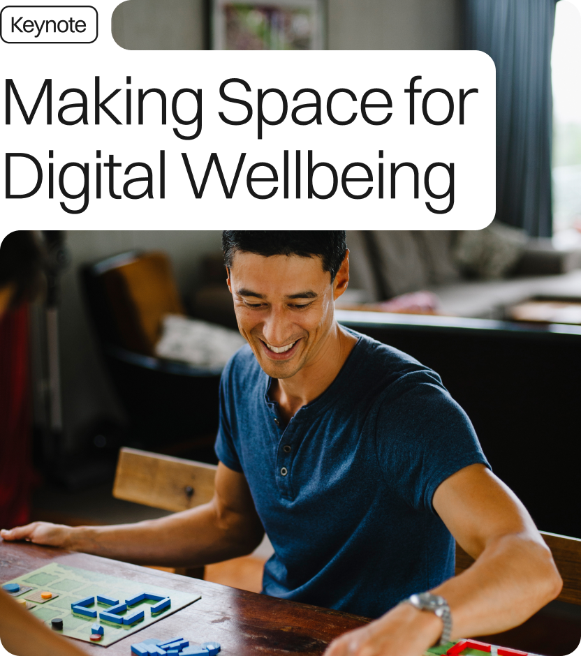 Daniel wears a navy blue top at home as he plays a board game. The text reads 'Making space for digital wellbeing keynote'