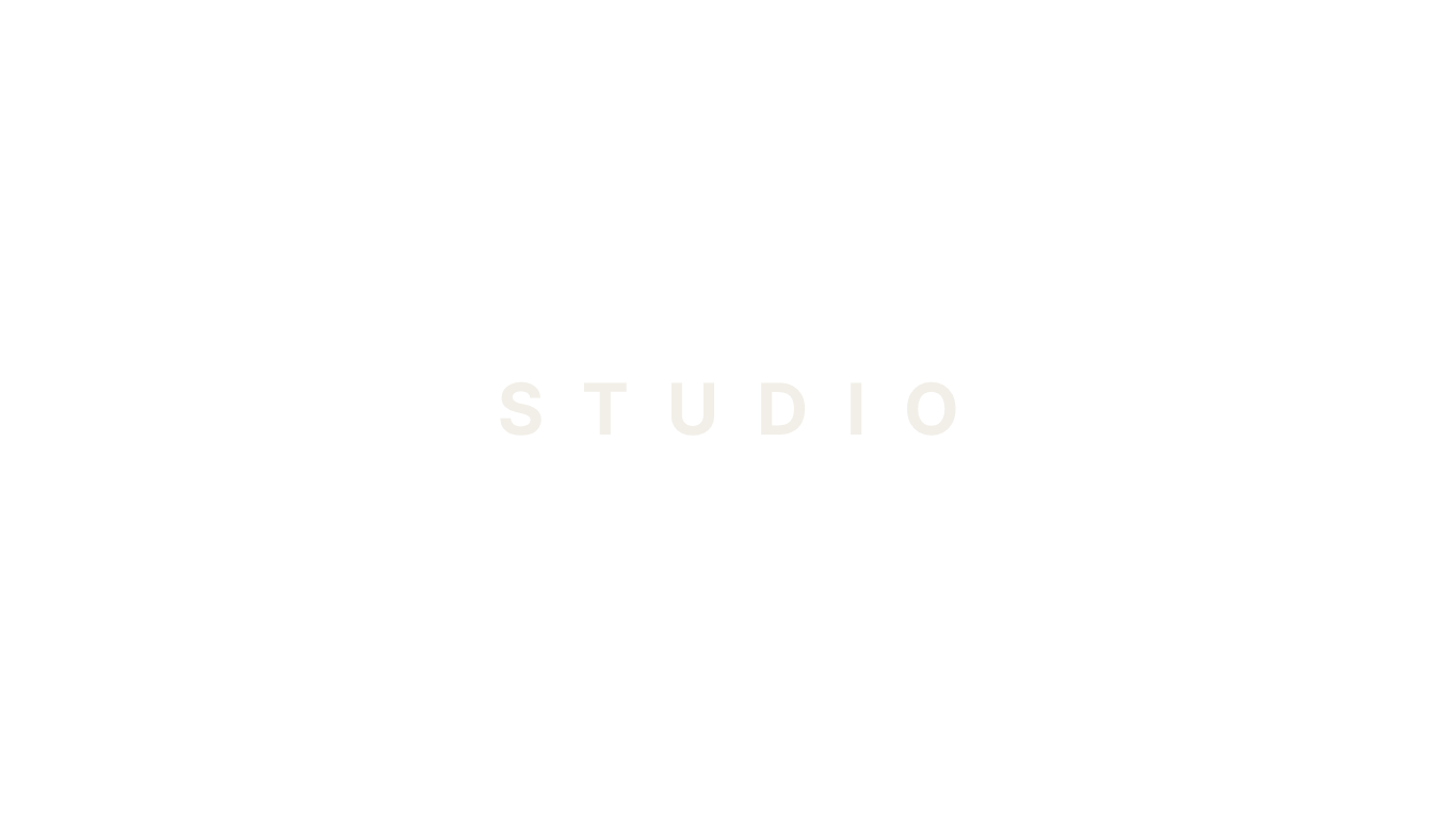 Black background with white text that says 'STUDIO' in the center.