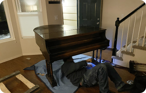 Piano moving services for a grand piano