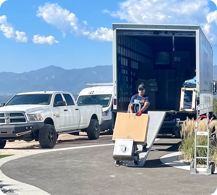 Highlands Ranch mover loading furniture into a truck