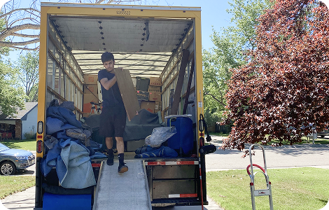 Furniture delivery mover loading bulky items