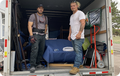 POD loading crew with packed moving equipment