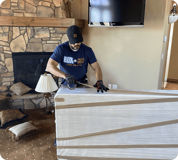 Arvada mover wrapping furniture for relocation