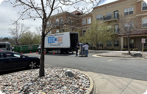 POD loading crew near a moving truck