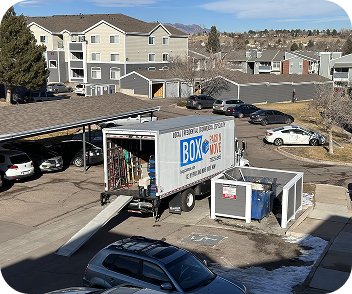 Household moving truck with loading ramp