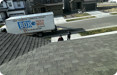White-glove moving truck outside a residence