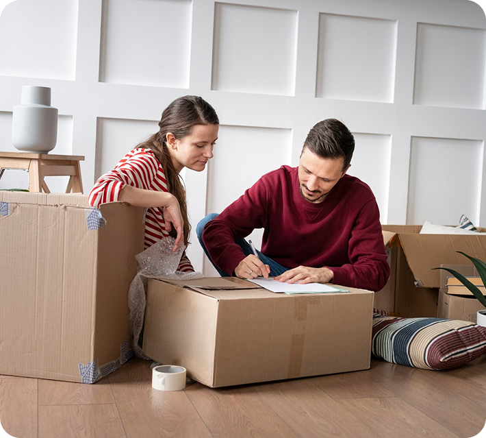 Customers preparing moving boxes for relocation