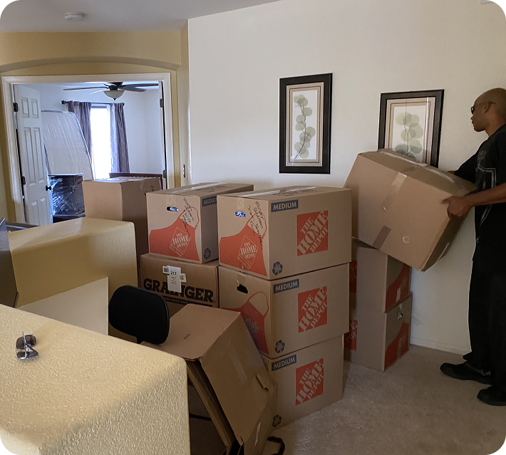 Peyton movers handling household moving boxes