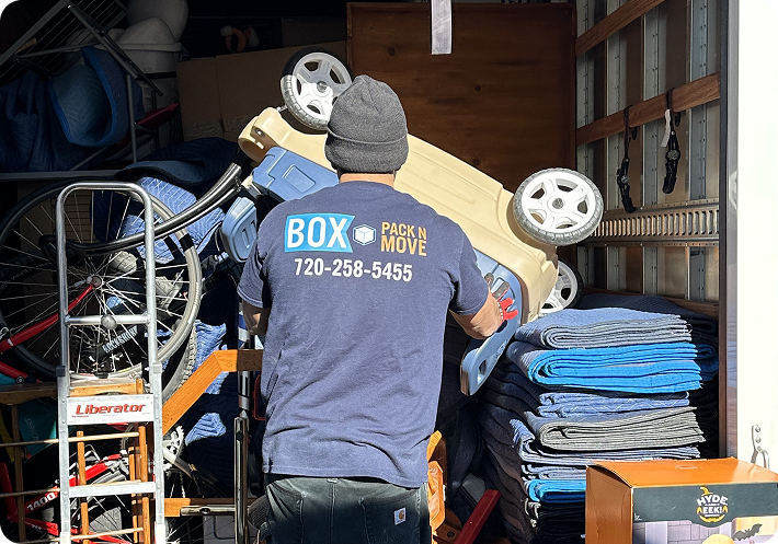 Interstate moving truck being loaded with furniture
