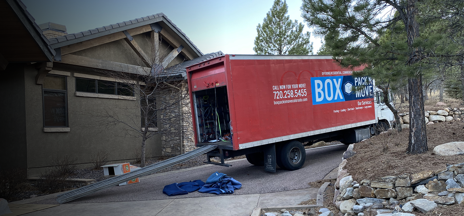 Residential moving company truck outside a home in Colorado Springs