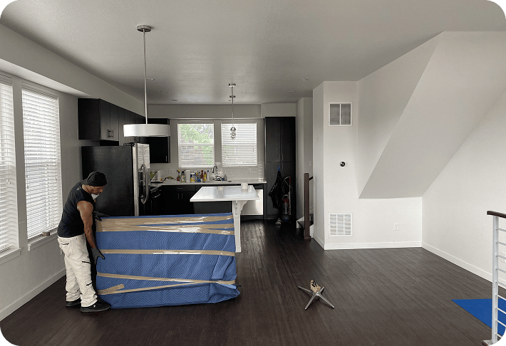 Home decluttering with packed and protected furniture