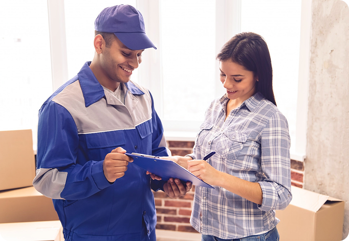 Moving specialist reviewing relocation details with a customer