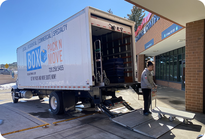 Box Pack N Move truck with loading lift and moving equipment