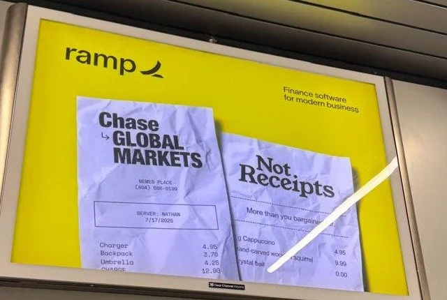 Ramp lightbox ad at Chicago O'Hare: two crumpled receipts on a yellow background, one headed "Chase Global Markets", the other "Not Receipts", with the Ramp logo and the line "Finance software for modern business".