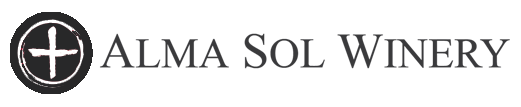 Logo of Alma Sol Winery with a circular emblem containing a cross and the winery's name in black text