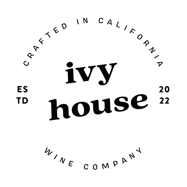 A circular logo for Ivy House wine company, established in California in 2022.