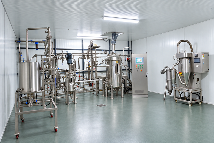 A pilot-scale fermentation skid and spray dryer in a clean pilot plant