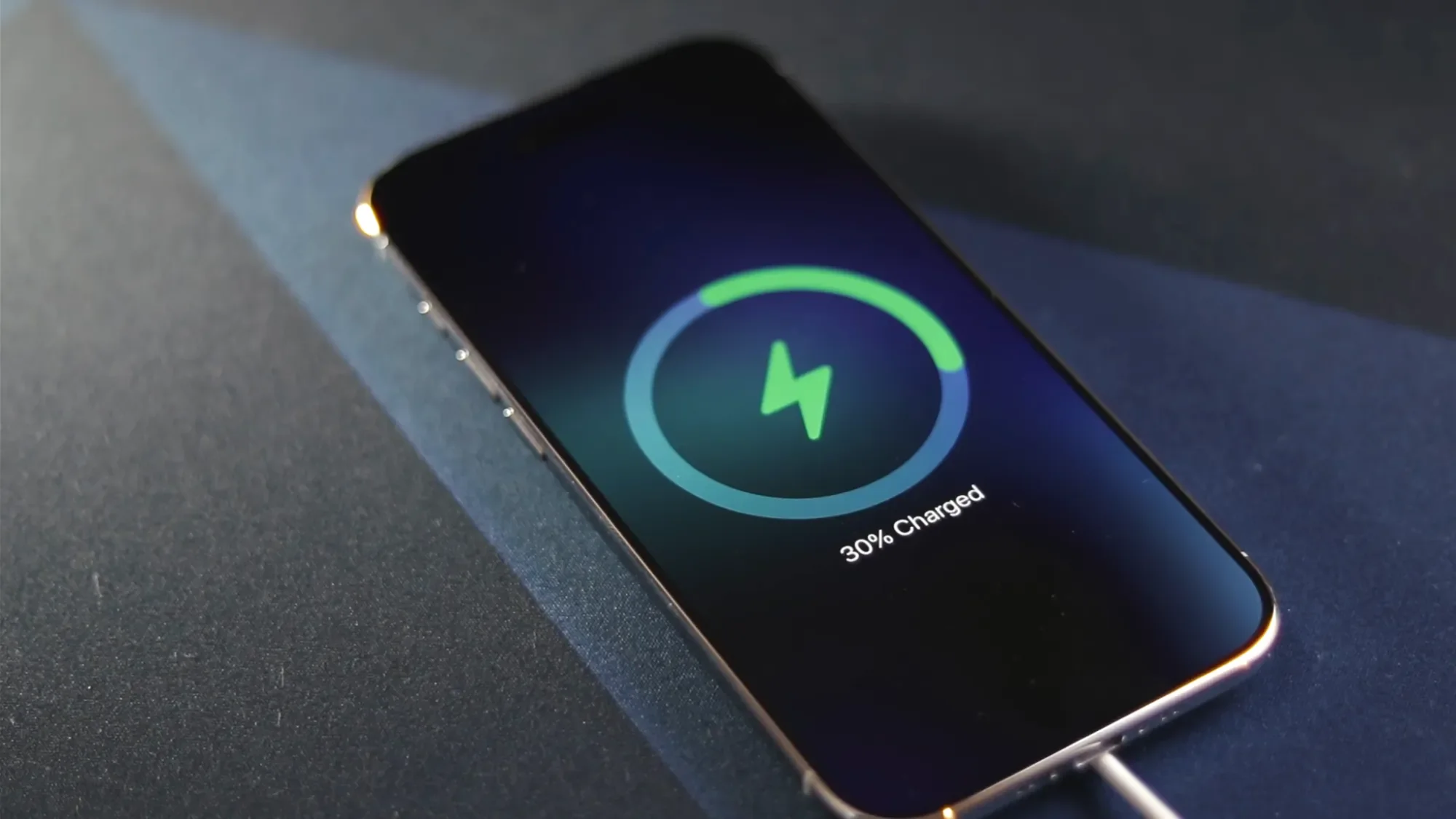 iPhone Air on a charger showing the charging symbol