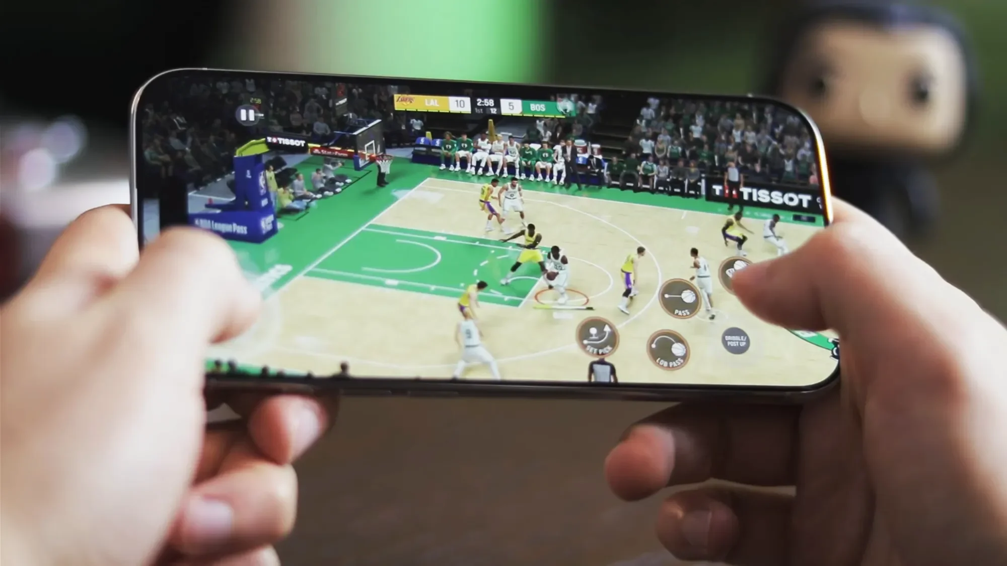 Playing a basketball game on an iPhone Air held sideways