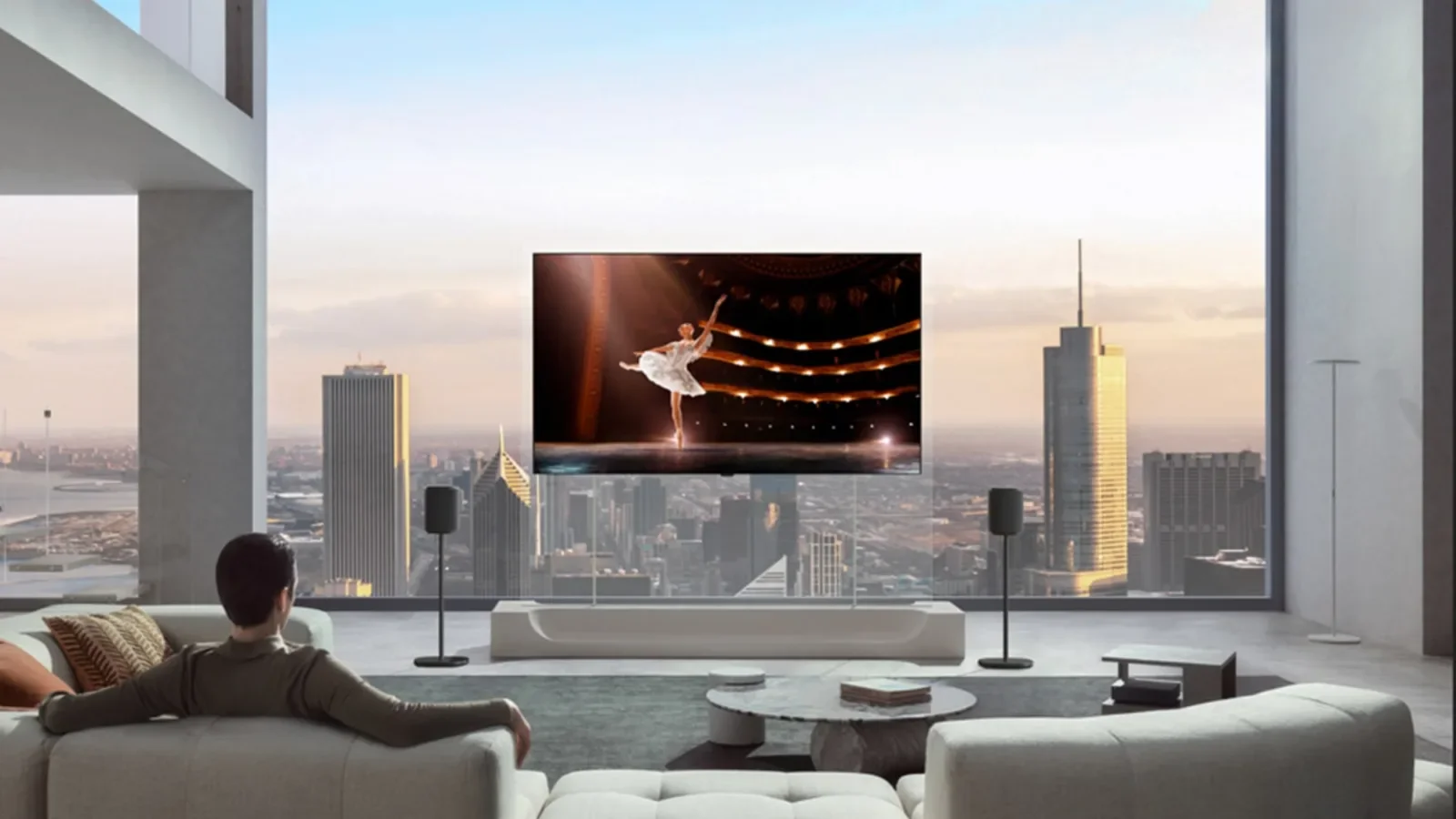 LG OLED TV with no backlight showing a ballet performance in a living room