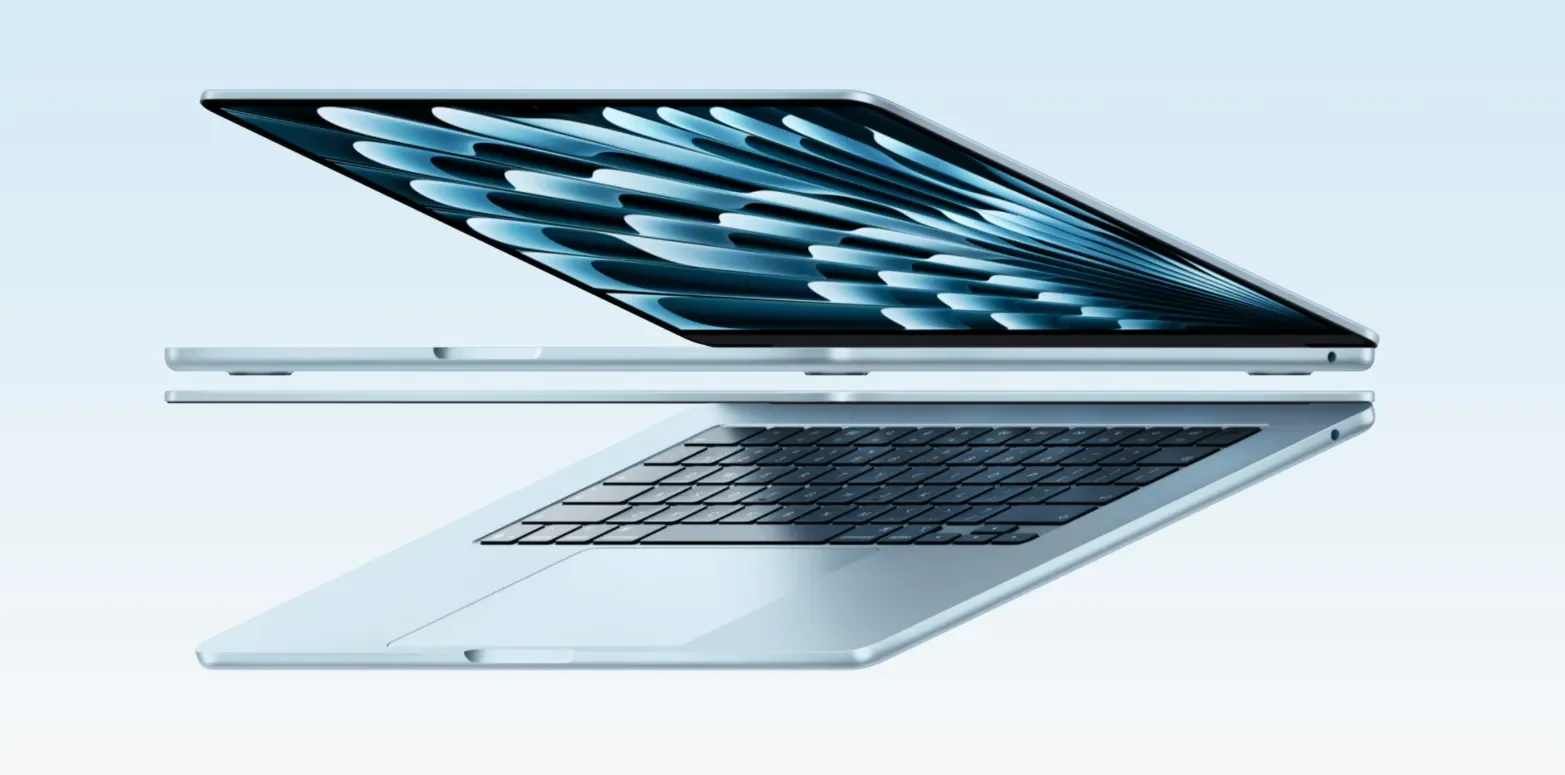 MacBook Air in light blue, half open, side view