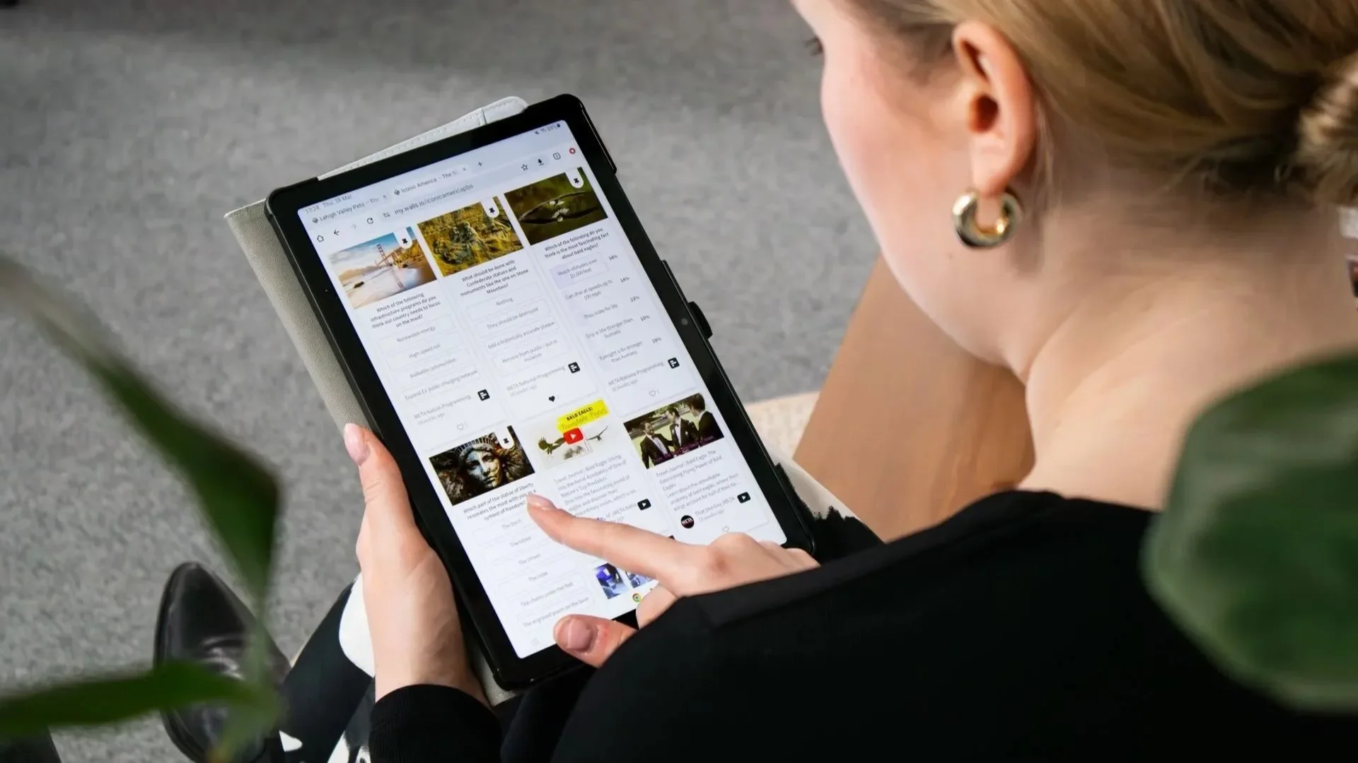 Woman browsing a website on a tablet