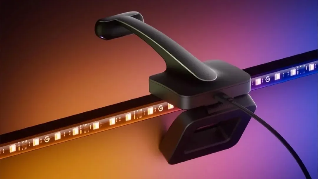 Govee TV backlight camera mounted on top of a TV next to an LED strip