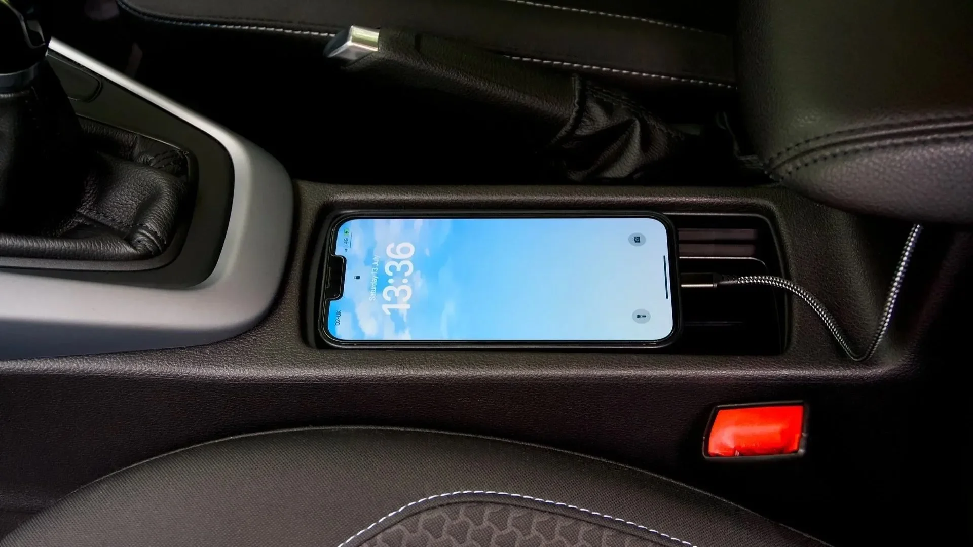 Phone charging on a wireless pad in a car's center console