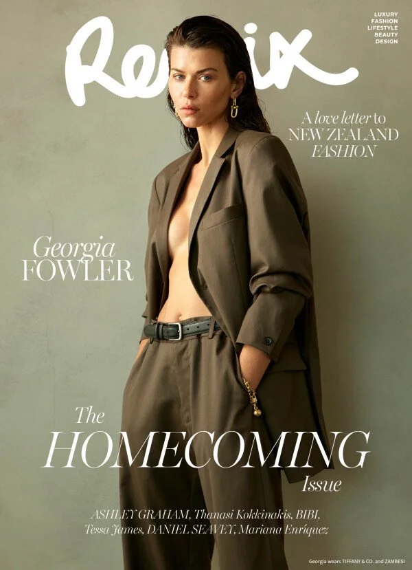 Cover of a fashion magazine titled 'Relix' featuring a woman in a brown suit with no shirt underneath, posing against a plain background. The woman has dark hair, gold earrings, and a bracelet. The cover text mentions Georgia Fowler and the theme of 