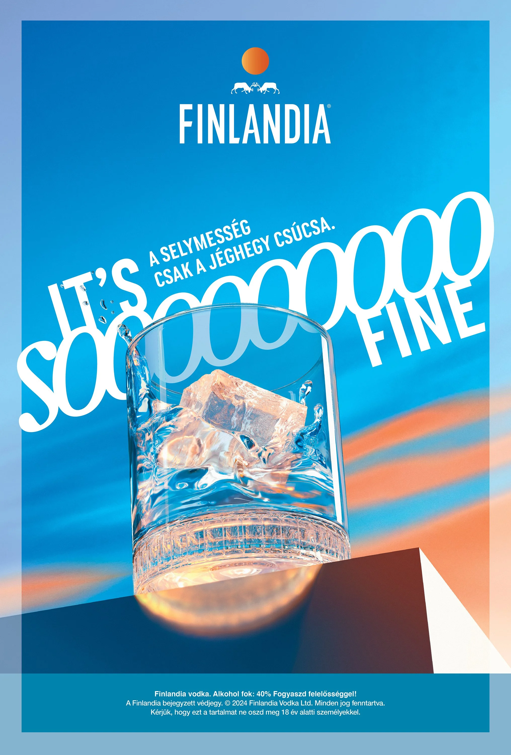 A promotional image for Finlandia vodka featuring a glass filled with ice and liquid, with a bright blue background. There is text in Hungarian and Finnish about the product, along with the Finlandia logo, which includes two reindeer and an orange su