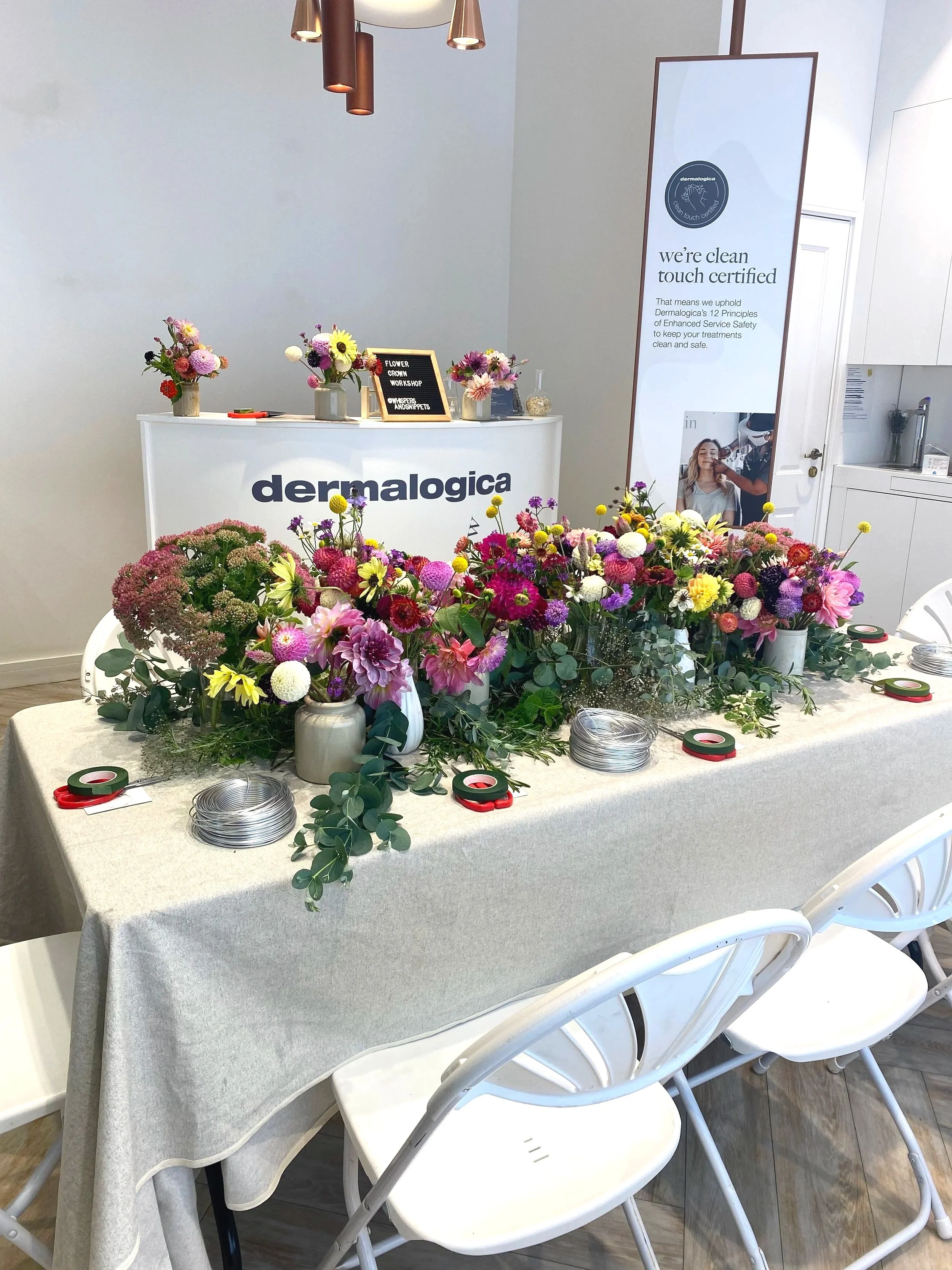 A corporate flower workshop in store for Dermalogica in Covent Garden. London as part of Chelsea Flower show. Creating flower crowns for guests including Georgia Toffolo.