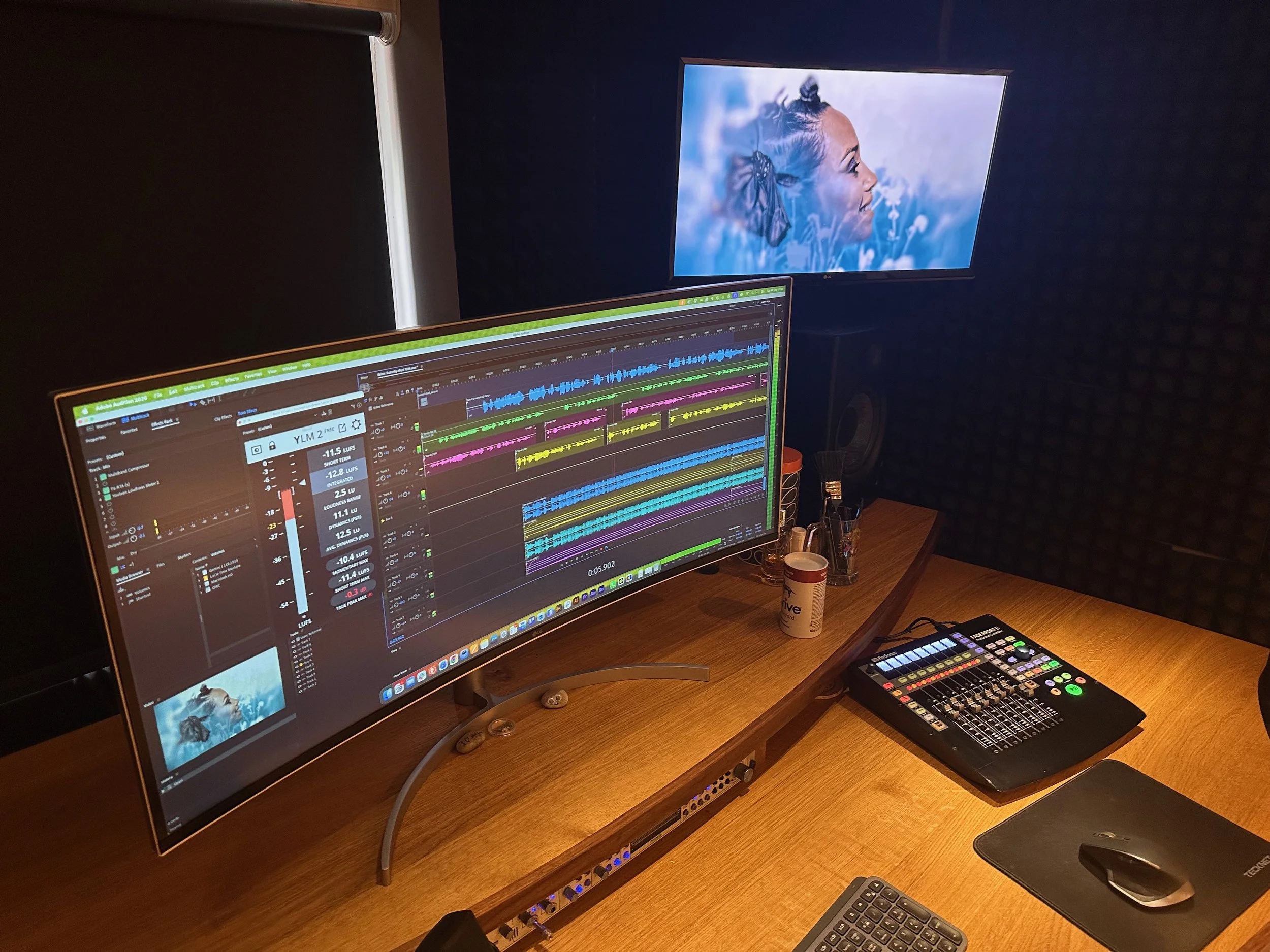 Professional audio production suite at Guy Kendall's voice-over studio, featuring digital audio editing software, mixing equipment and acoustic treatment.