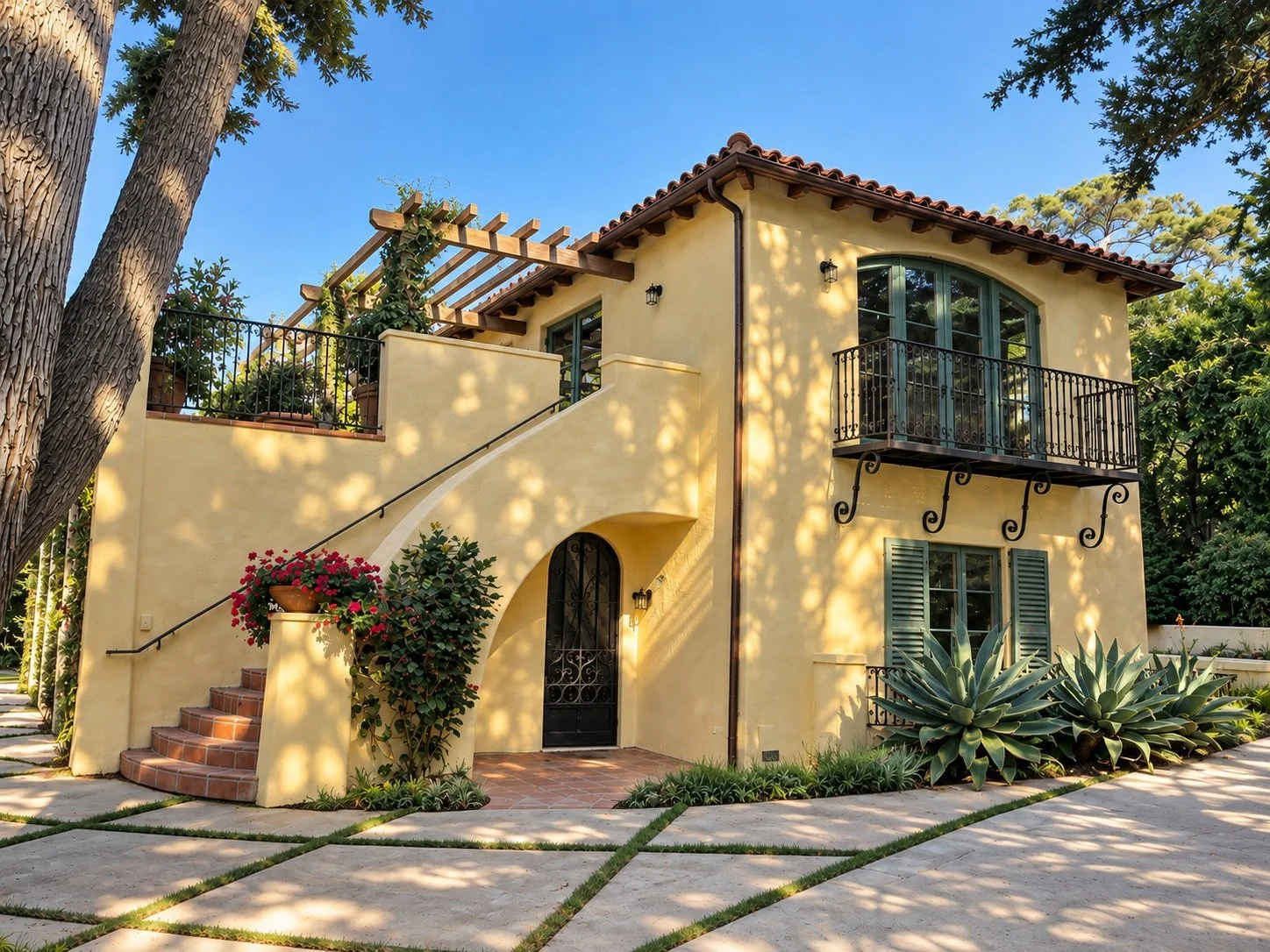 A seven-car garage, private cinema below and game room above.

Three levels of custom construction, built from the ground up and finished in the Spanish Colonial tradition: hand-troweled plaster, clay tile roofing, and hand-forged ironwork. A sweepin