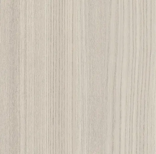 Close-up of a light-colored wooden surface with vertical grain lines.