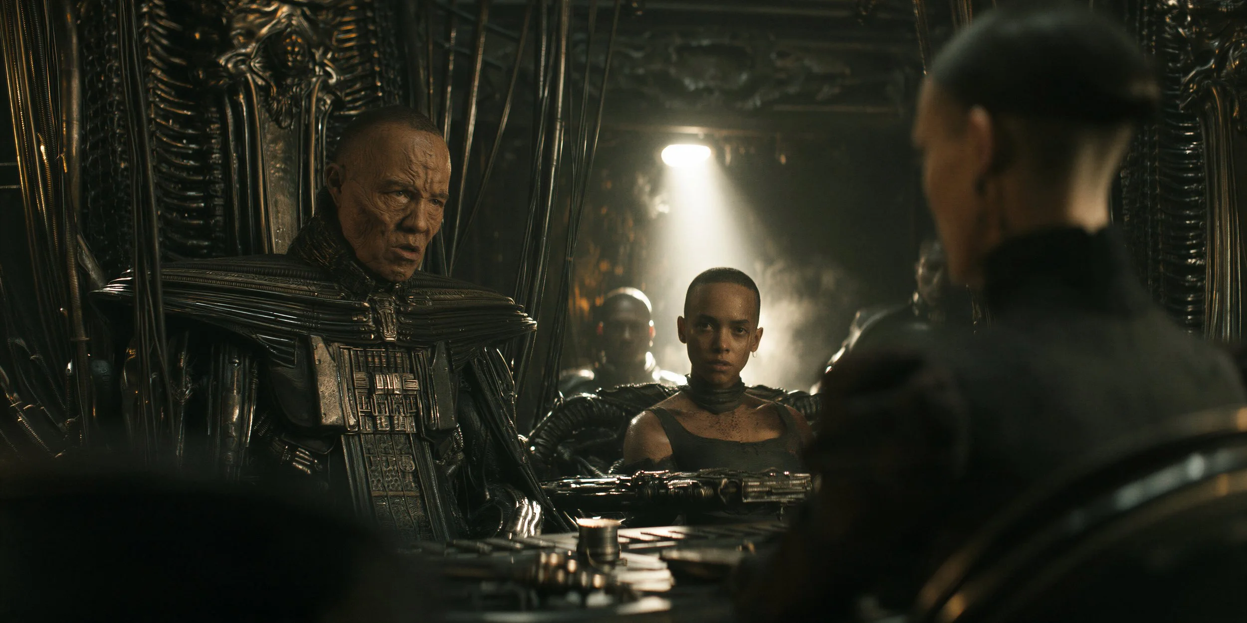 Fixed_magnific-uffvcV7JqXCogAMCJaYl-58_commoncbcine_Over_the_shoulder_shot_from_behind_an_interrogator_dre_f410eb57-9e3d-449d-bef9-e5491128744d_0%20copy copy.jpg