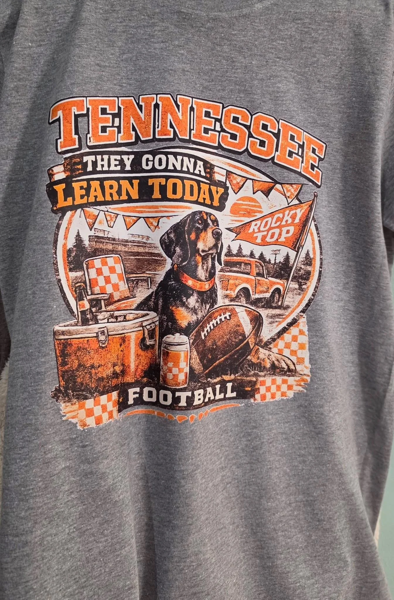 Custom printed Tennessee themed T-shirt by Forge & Fiber Designs. Custom shirt with the text 'Tennessee They Gonna Learn Today Rocky Top Football'.