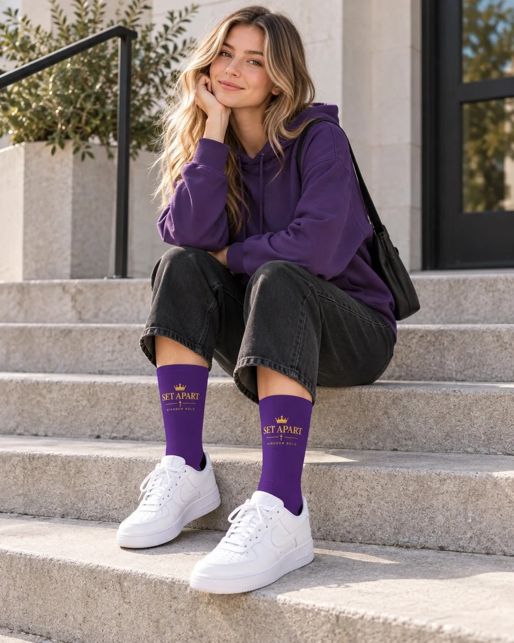 Set Apart purple socks worn by a model