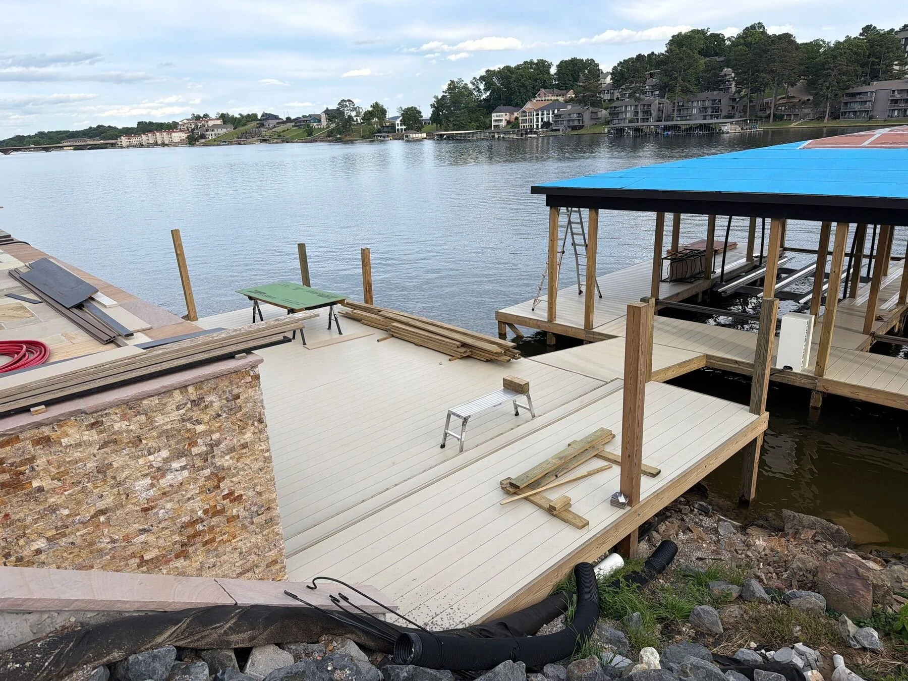 Canopy boat lifts alongside a composite dock, Lake Hamilton