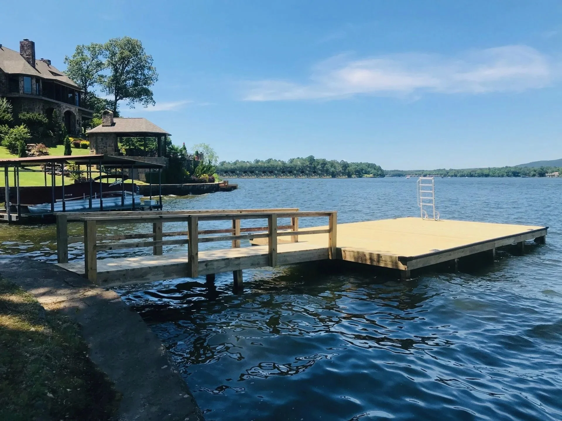 Swim dock platform anchored off a Lake Hamilton shoreline