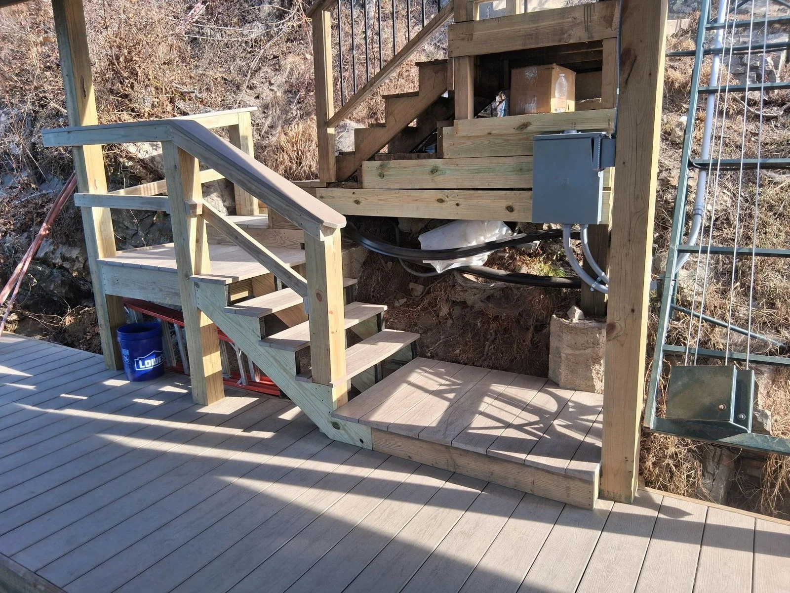 Stair landing cut to the rock face at Cougar Terrace