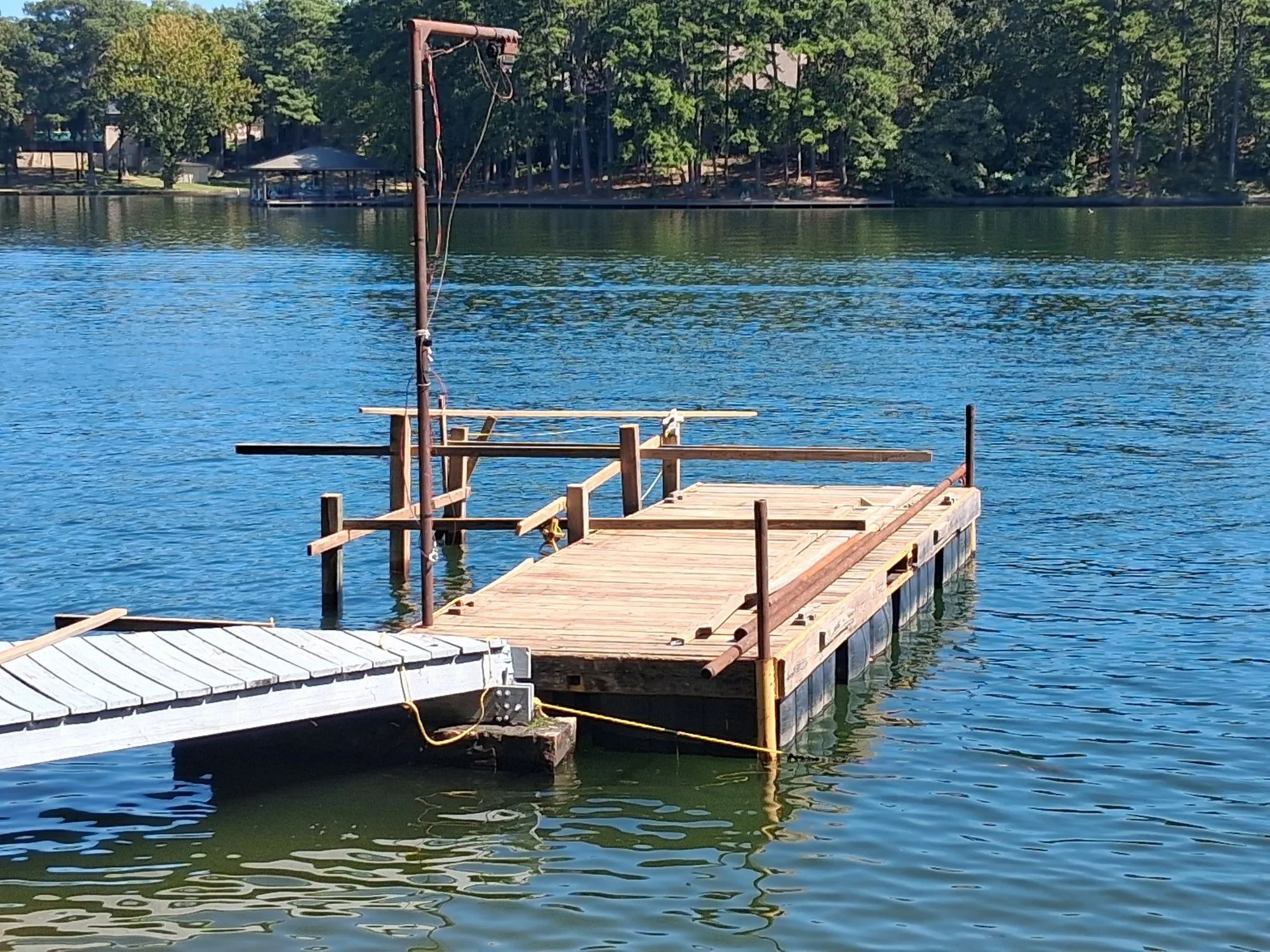 New deck boards going down during a dock rebuild on Lake Hamilton