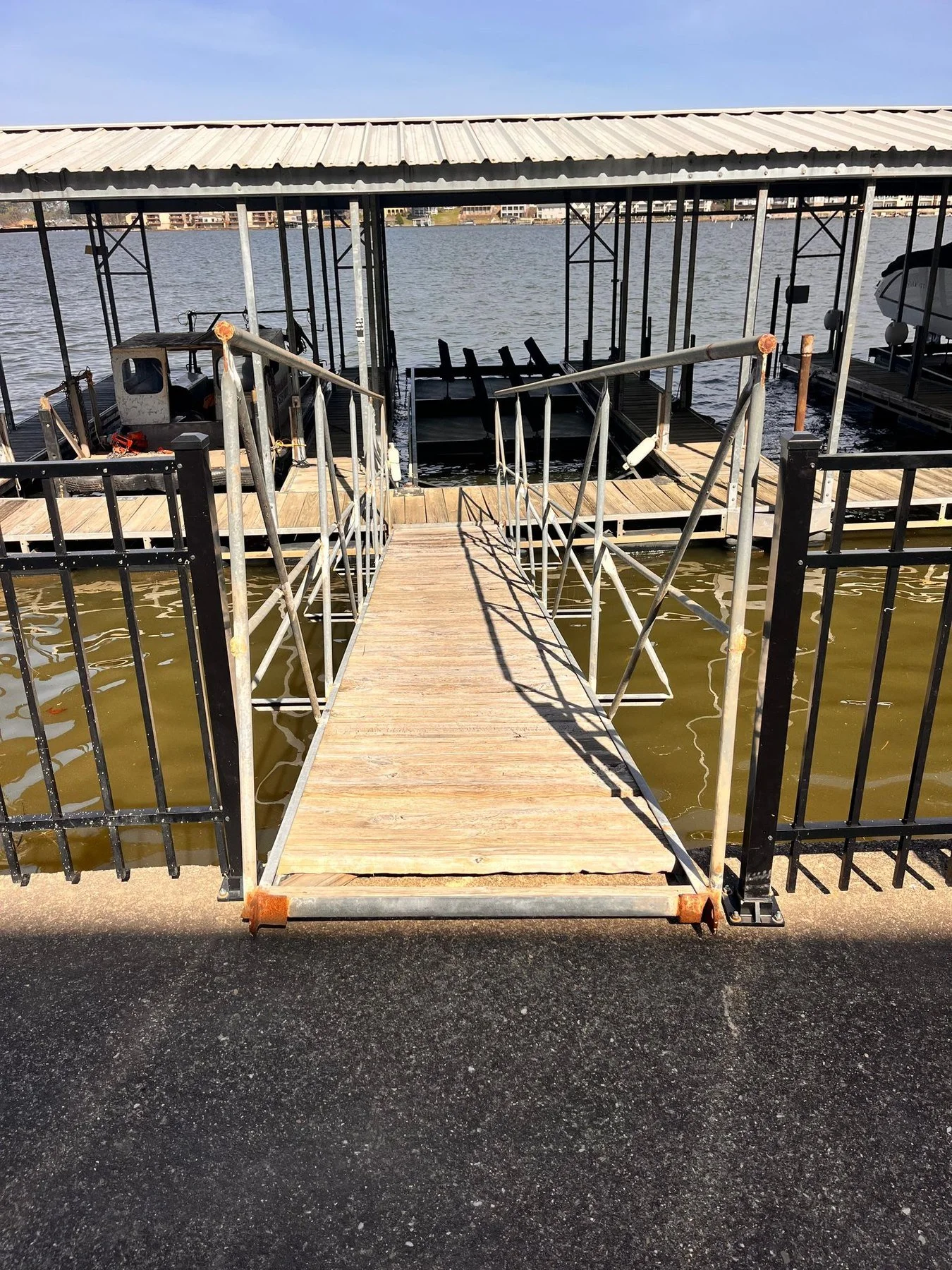 Dock walkway lifted onto the bank during spring draw-up on Lake Hamilton